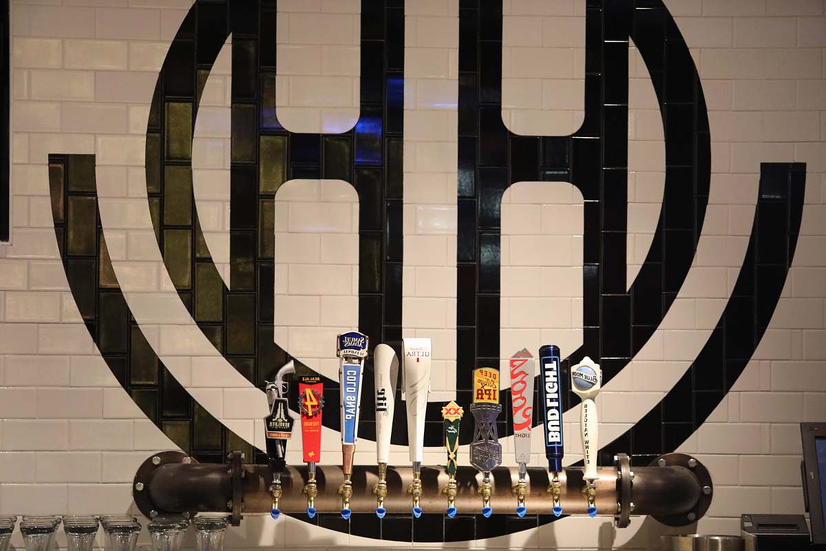 happiest hour assorted-color beer tap handles dallas
